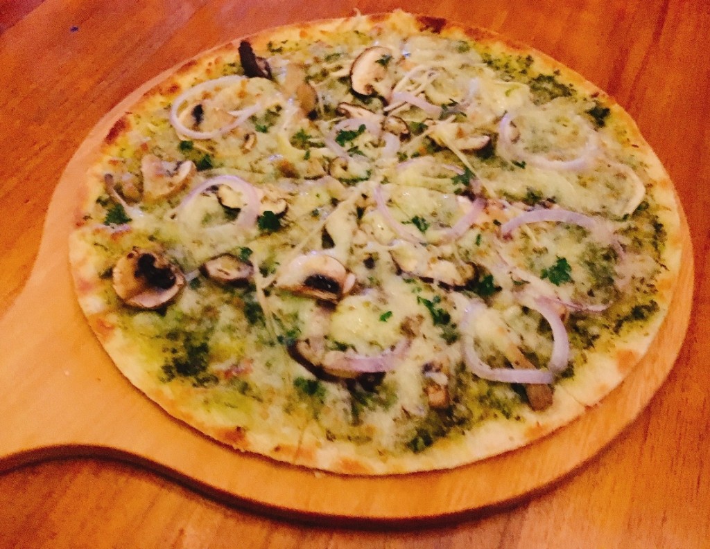 Four Styled Mushroom Pizza with enoki, button, shiitake and oyster mushrooms with basil pesto