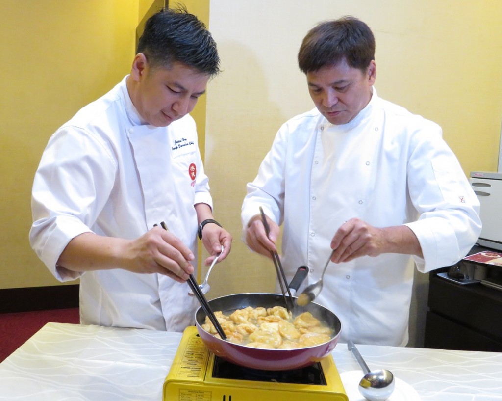 Chef Justin, left and Chef Peter turning out the Scallop in Golden Egg White Souffle