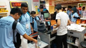 Shopping for supplies at a supermarket.