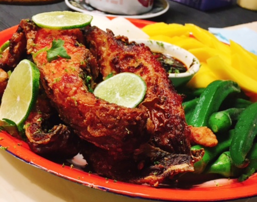 Stingray marinated with red wine mash and fried, served with mango ...