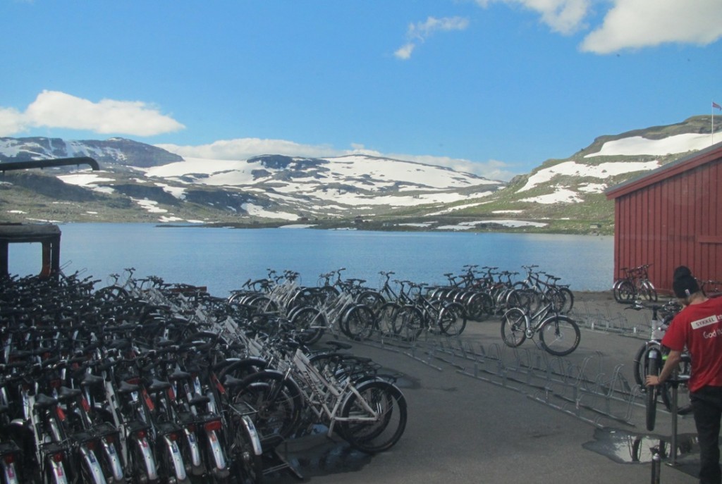 Norwegians love to cycle. Blue skies in the summer make it ideal for the outdoors though there is still snow on the mountains. A view from our coach