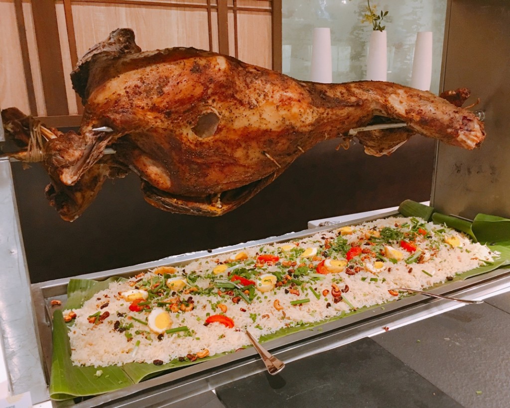 Lamb roasted with ghee and spices, with bryani rice beneath. The roast lamb is always the top draw at this Festive Dinner Buffet