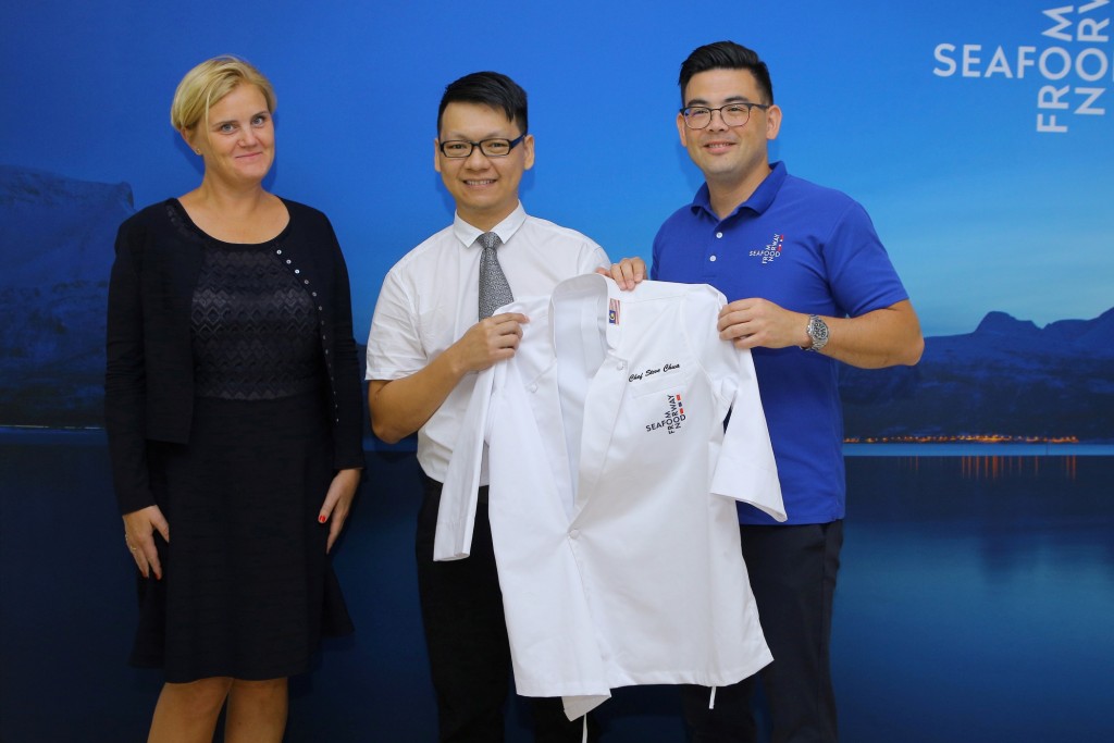 Presentation of chef's jacket to Chef Chua